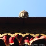 2014.12.15 Bhaktapur 36 Mahalakshmi Temple god peek ResizeBy Donna Yates CC BY-NC-SA