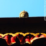 2014.12.15 Bhaktapur 38 Mahalakshmi Temple god peek ResizeBy Donna Yates CC BY-NC-SA